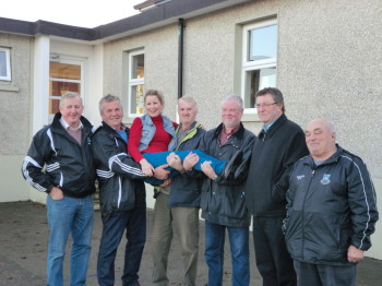 Glin G.A.A. members escort the Brosna woman off the premises.